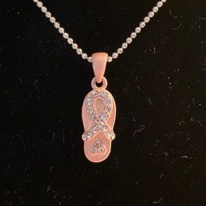 Silver chain necklace with pink flip flop charm; approx 16 inches long